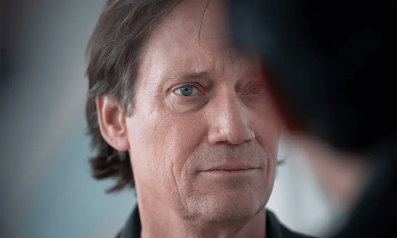 A close portrait of the film’s lead in low light