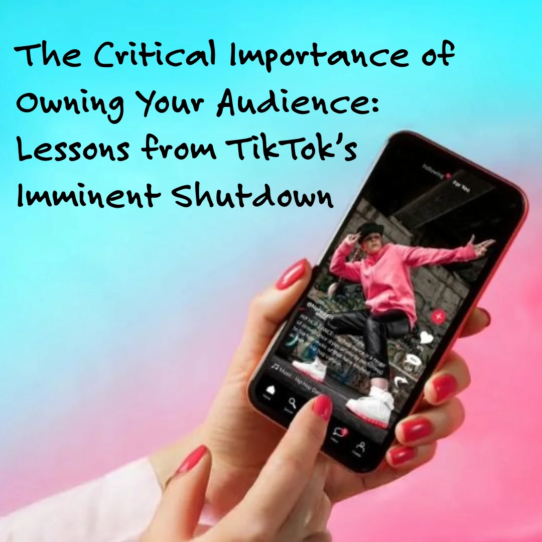 Hand with red nails holding a smartphone showing a video of a person in a pink hoodie and black hat dancing.