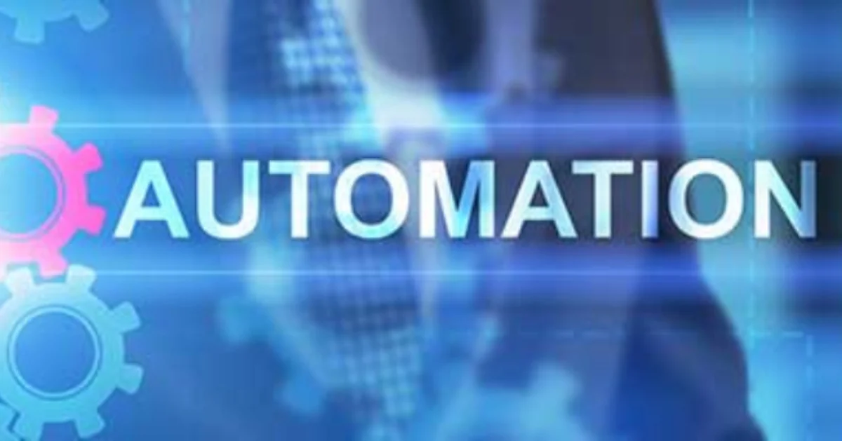 The word AUTOMATION in white capitals beside pink and blue gears, over a blurred suited figure.