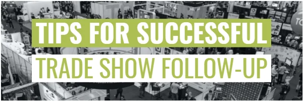 Overhead view of a crowded trade show floor with exhibitor booths and attendees.
